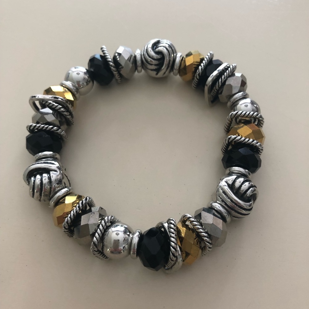 Chico’s stretch bracelet in silver, black and gold beads